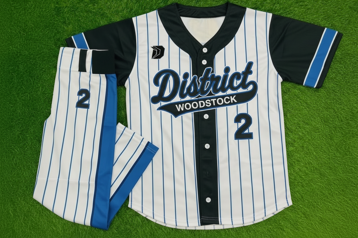 Baseball jersey with 'District Woodstock' and number '2' on a grass background