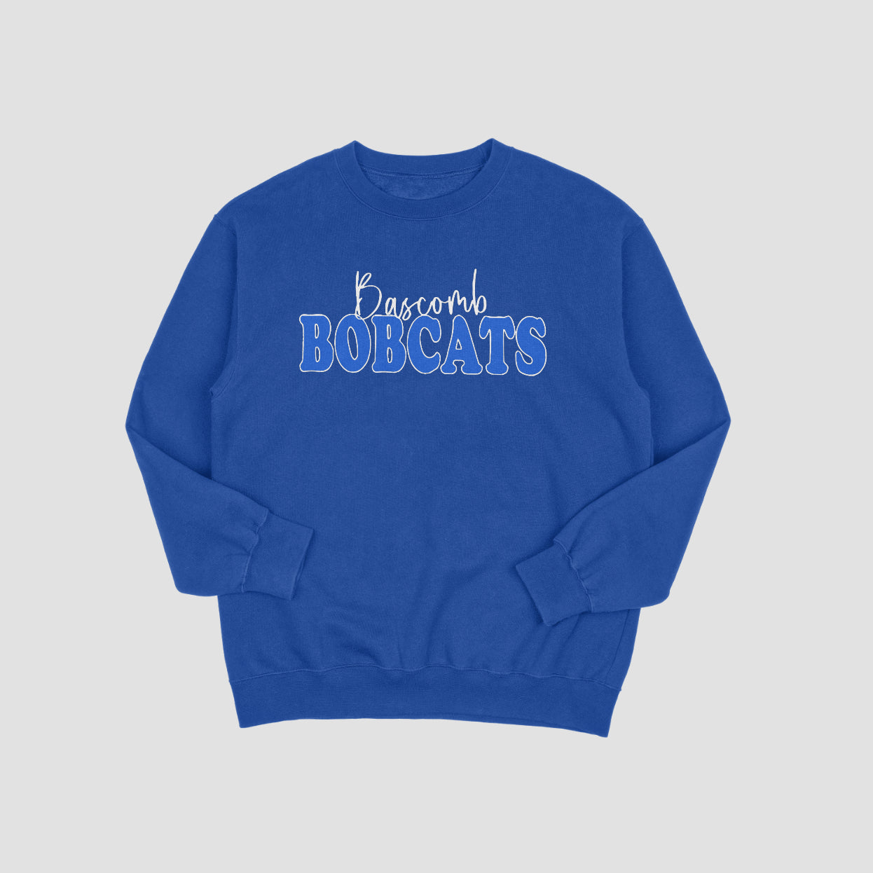 Blue sweatshirt with 'Bascomb Bobcats' text on a light gray background
